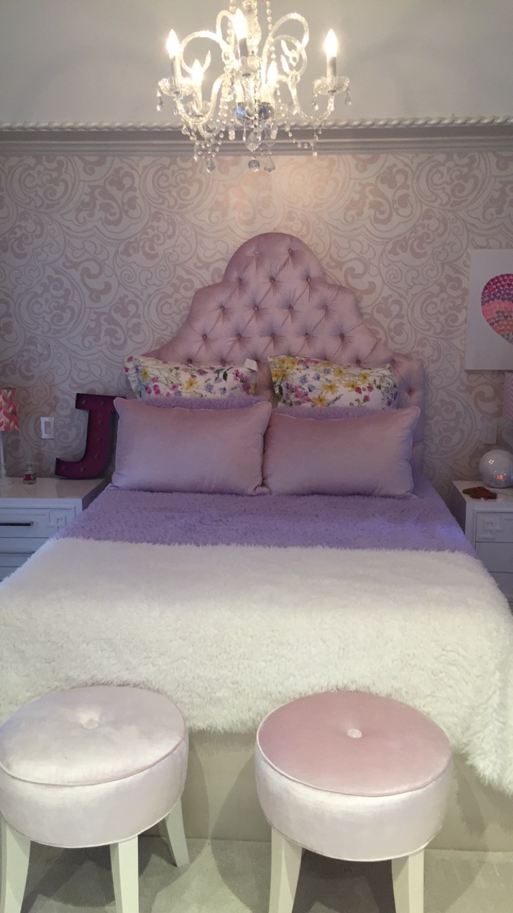 An original A & B tufted headboard with upholstered stools